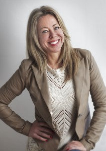 Personal portrait of Helen Hokin. Sitting down to chat about Stress Free Travel with