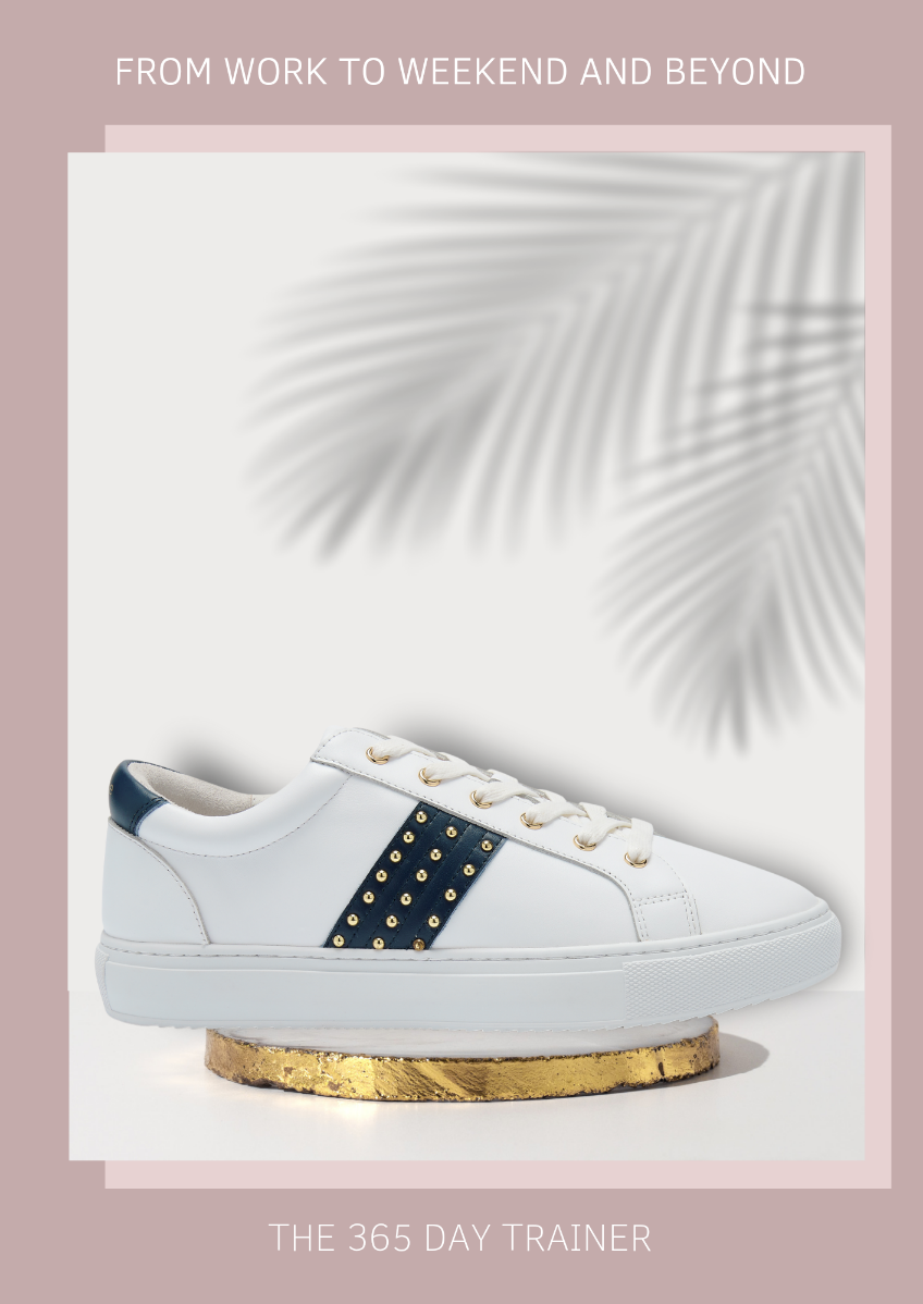 White trainer with navy studded strip. On gold plinth. This are seen as all-day comfortable trainers