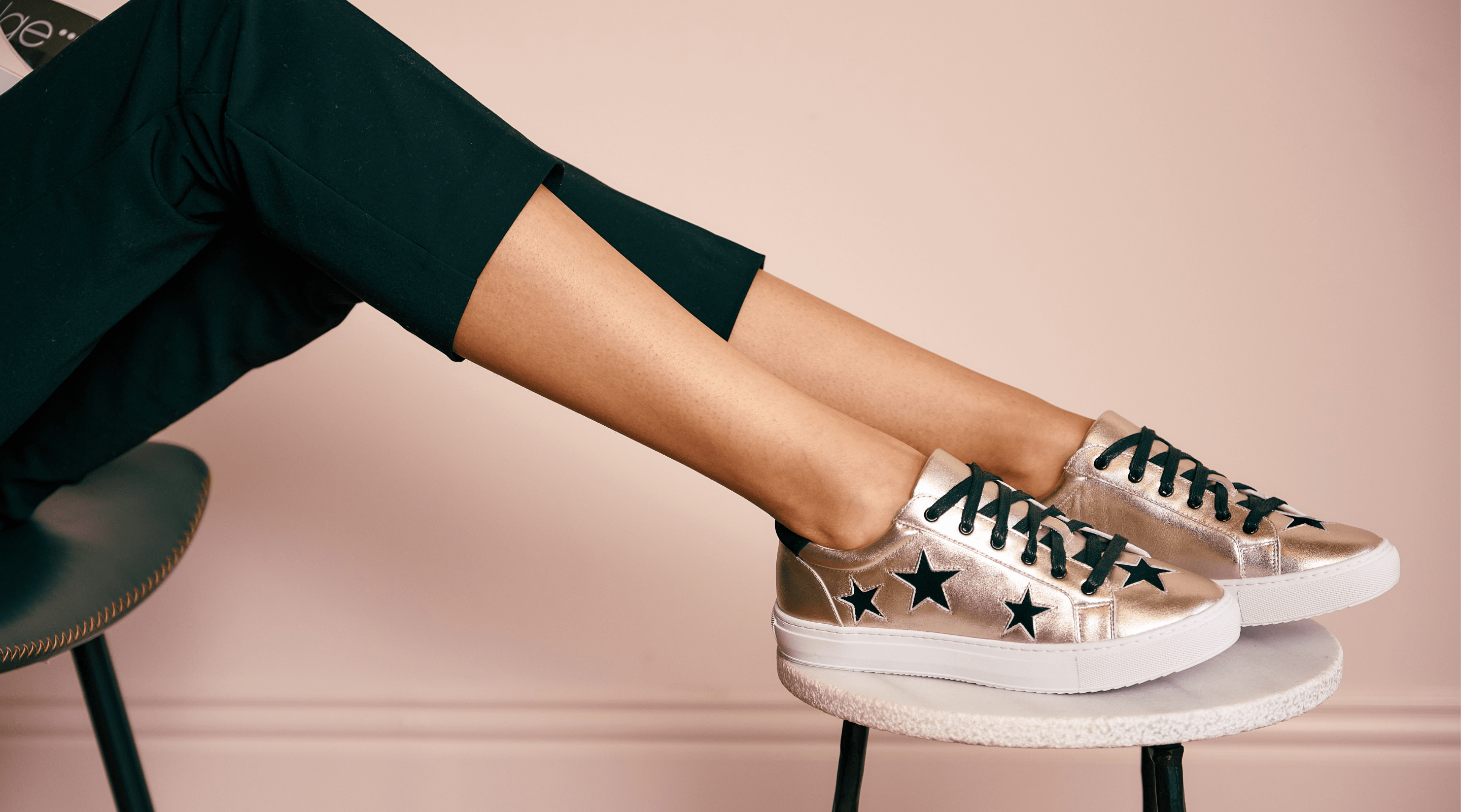 gold leather trainers with black stars for women