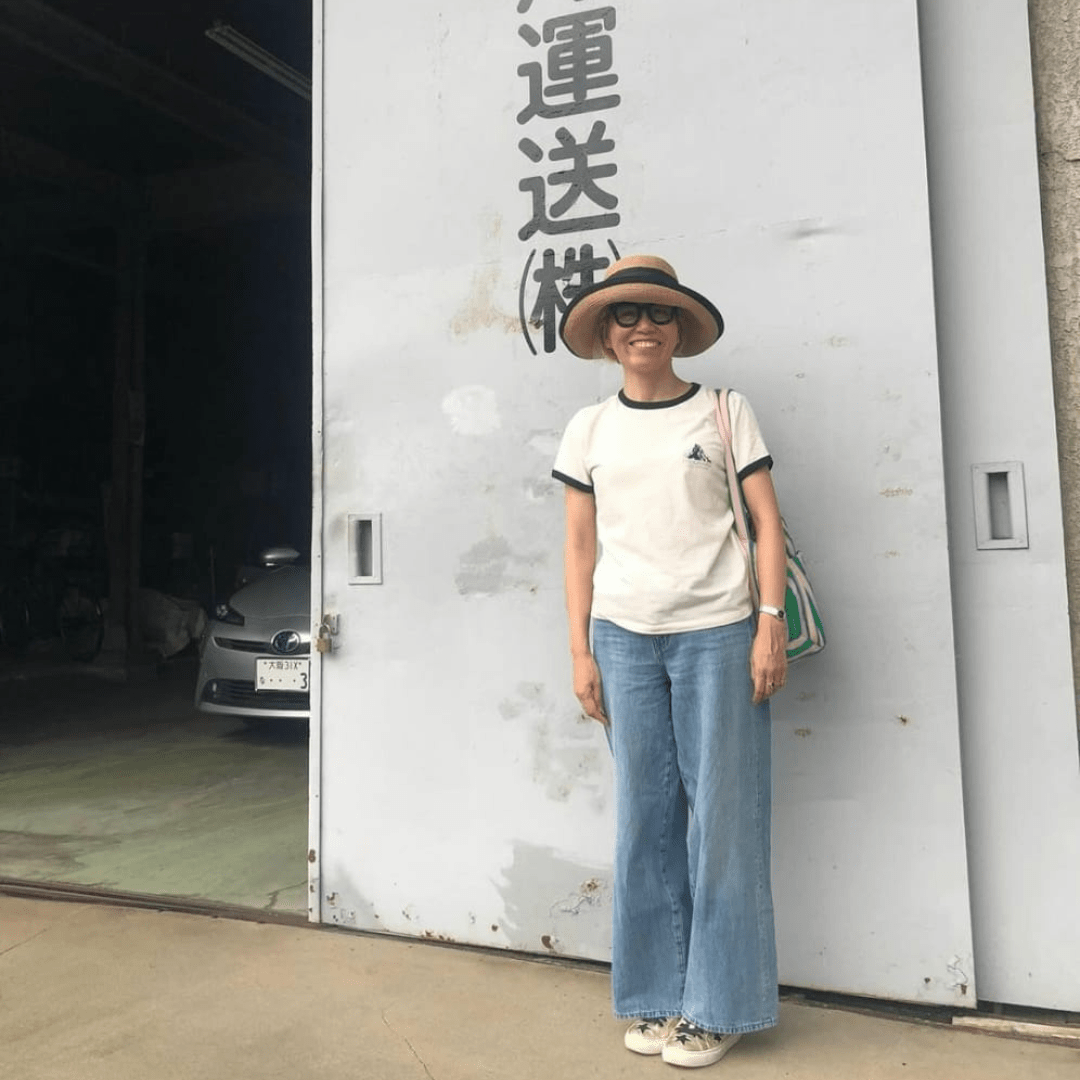 street style look with wide leg jeans and gold star trainers