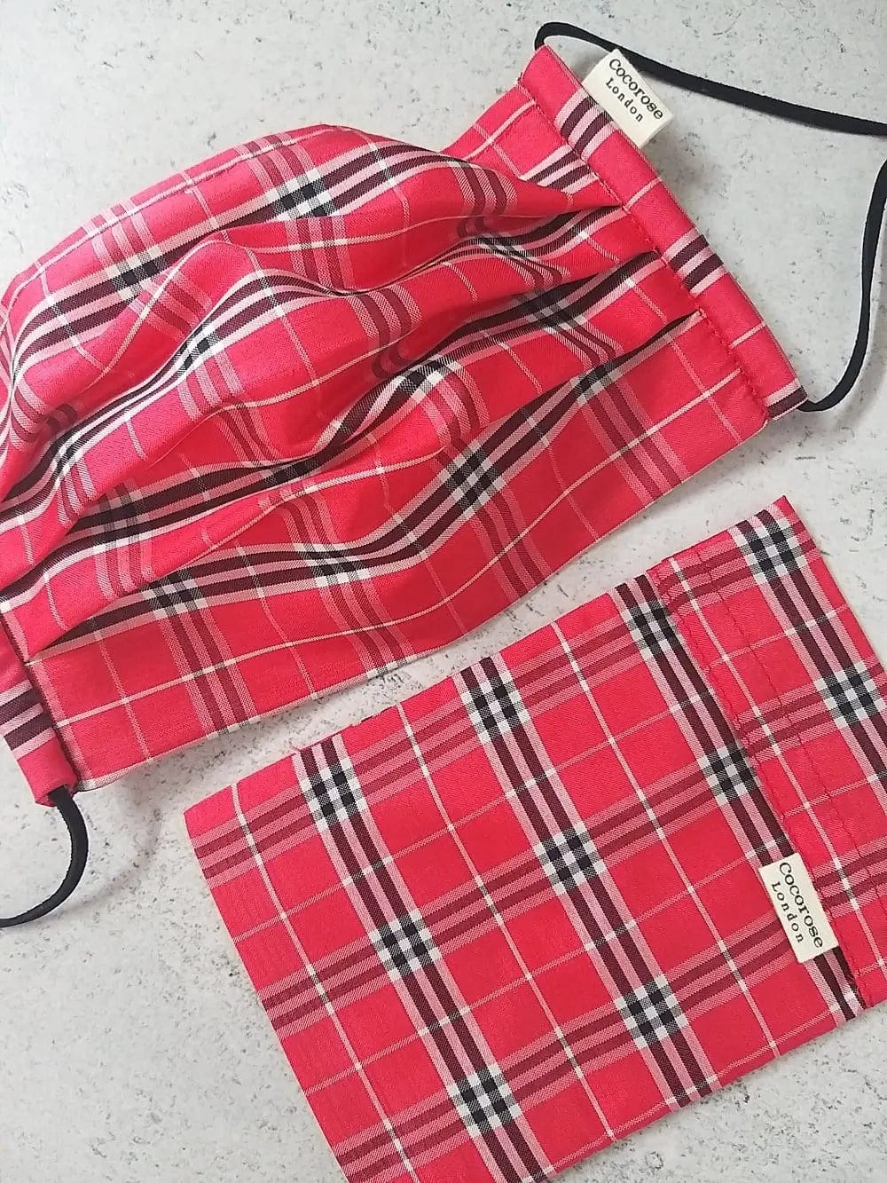 Red check pleated 100% mulberry silk face mask with mouldable nose wire, adjustable suede cord ear loops and matching storage pouch