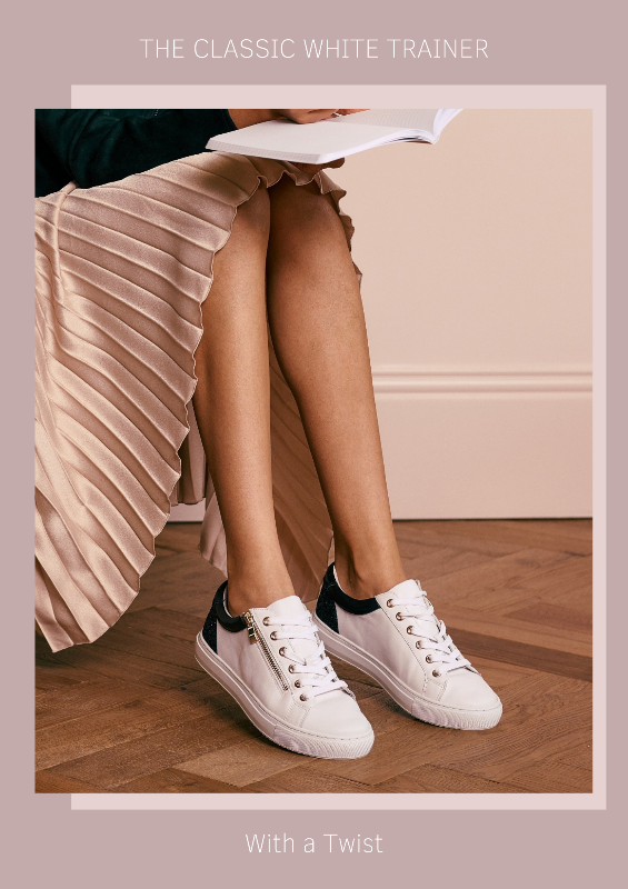 White leather trainers with side zips and black glitter heels