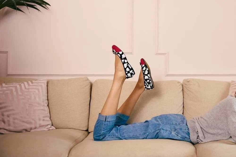 Women's Shoes, worn relaxed style on a sofa