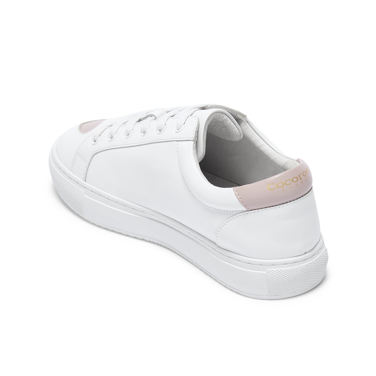 Elegant women’s white trainers with pastel pink hearts, designed for all-day comfort