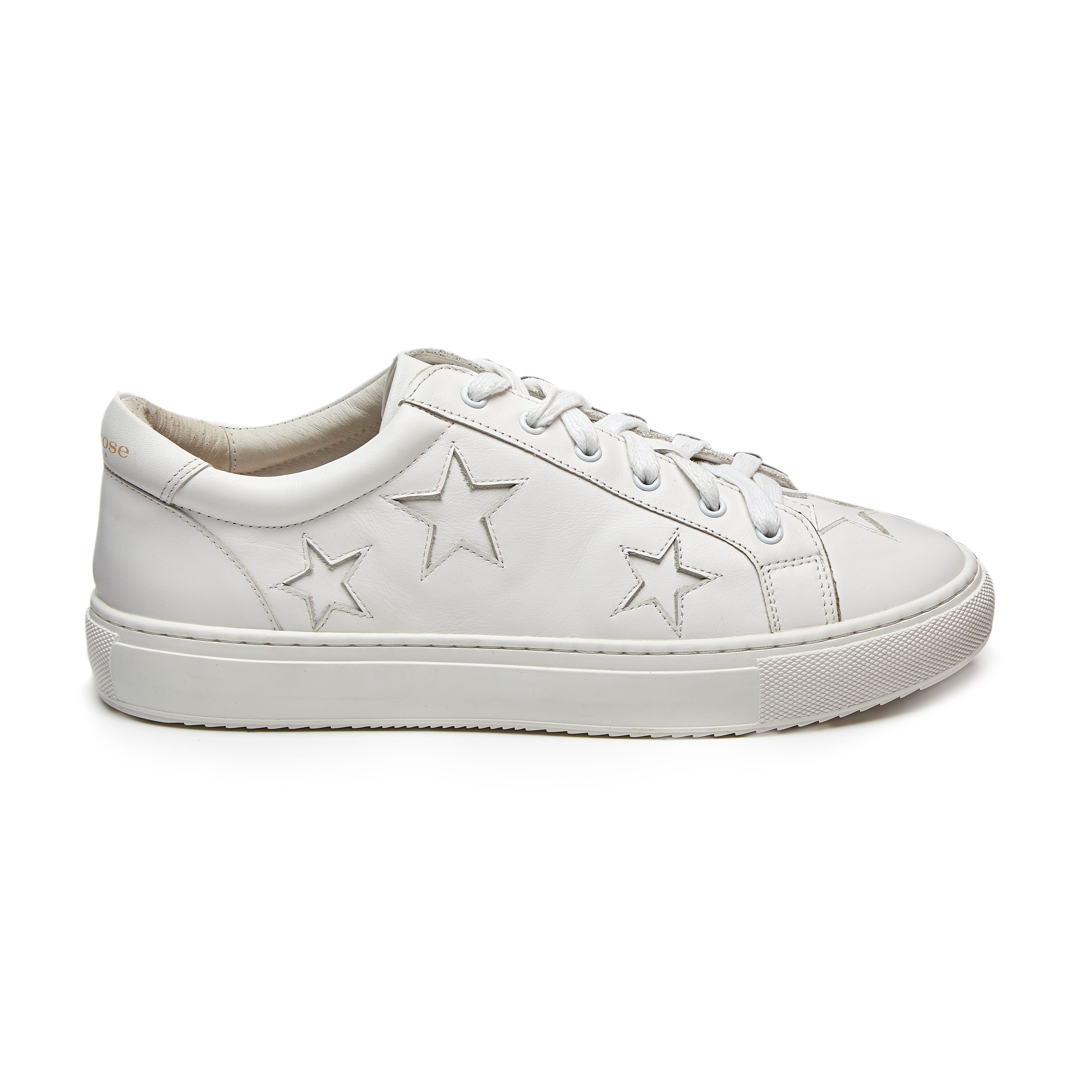 low cut white trainers with white stars 