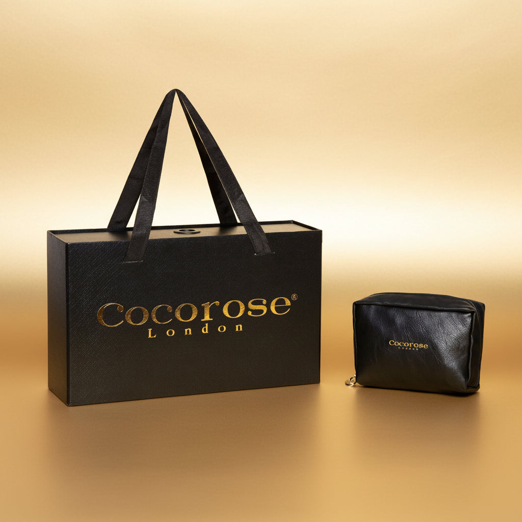 The shoe box and black travel purse for Gold leather ballet flats that are foldable - from Cocorose London